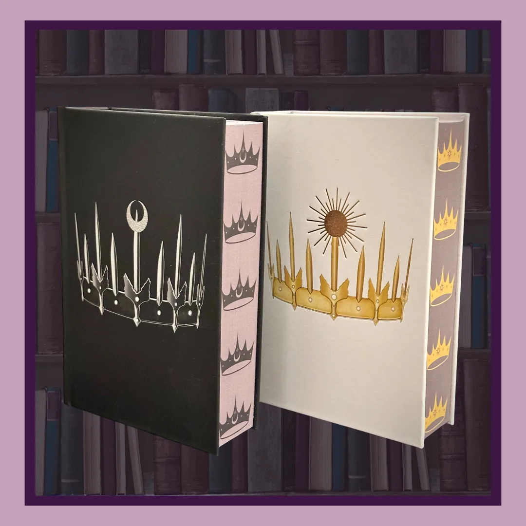 A Shadow in the Ember by Jennifer L. Armentrout, two editions. The black Death edition with a silver moon crown and the white Life edition with a gold sun crown, crowns printed along their edges.